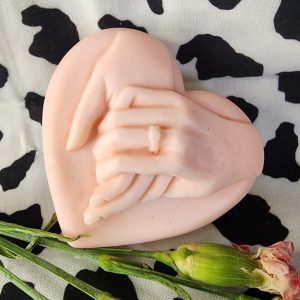 Mains unies sur un Fond Coeur